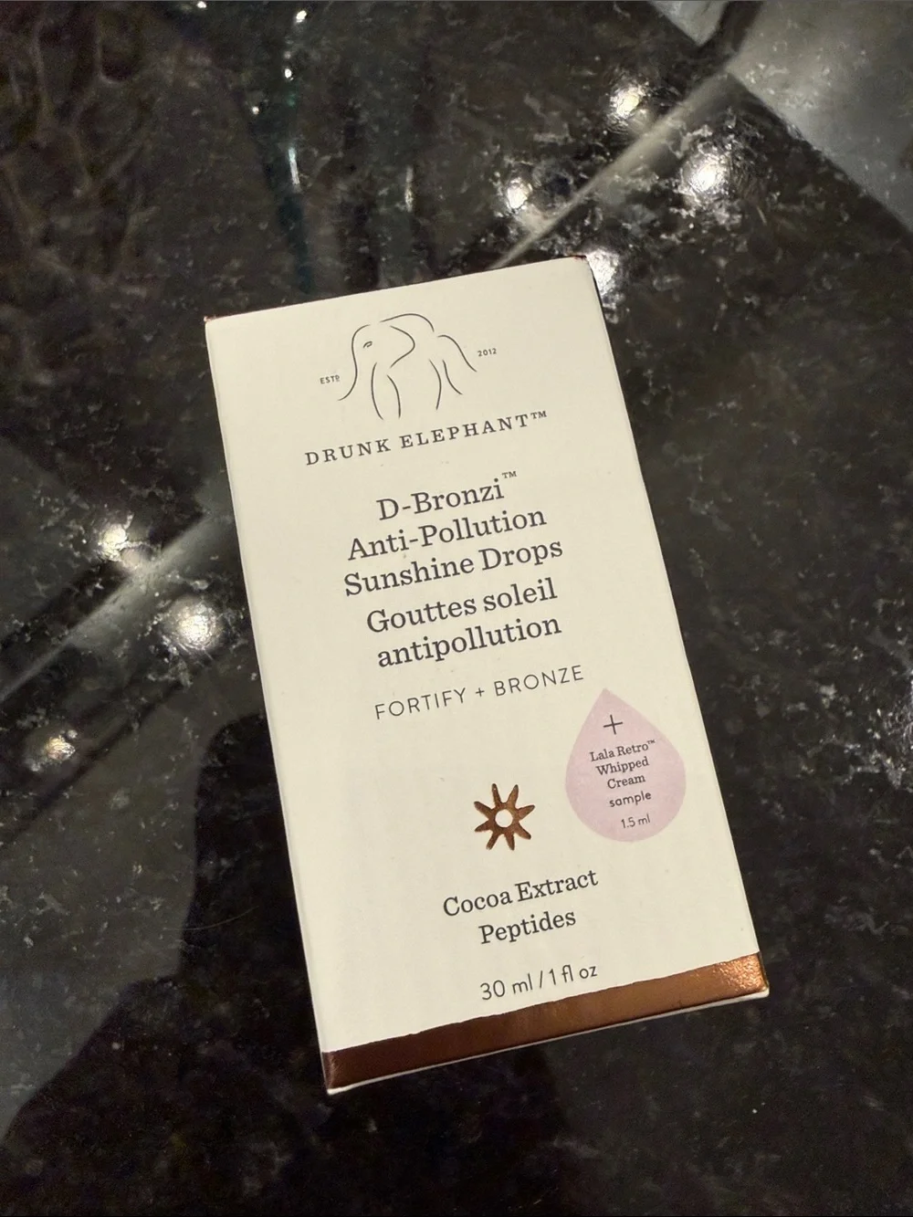 Drunk Elephant White Box with Gold Imprint